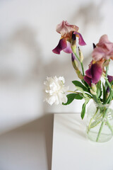 Floral Arrangement with Irises and White Peonies in Glass Vase, Minimalist Home Aesthetic