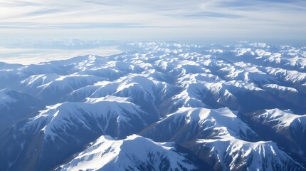 Aerial view of vast snowy mountain landscape