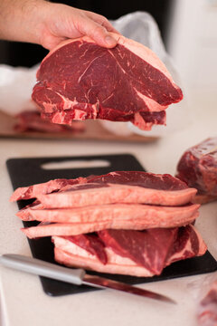 getting steaks ready to freeze in meal sized portions