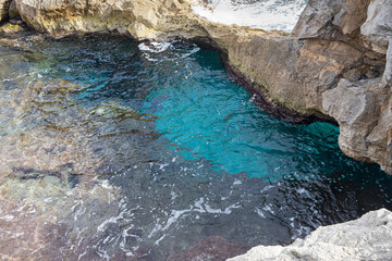 Obraz premium Rock formations and turquoise waters of the coast of Menorca, Spain