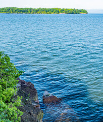 Landscape view rocks and water on Lake Champlain
