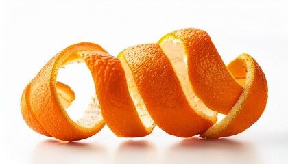 vibrant orange peel curls on white background