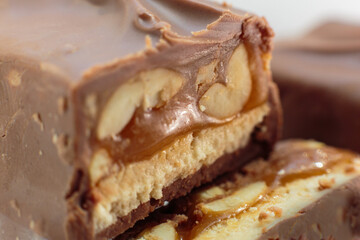 Section in chocolate with caramel and peanuts bar
