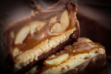 Section in chocolate with caramel and peanuts bar