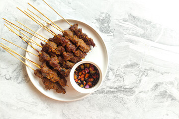 Sate maranggi. Indonesian traditional beef satay. with copy space.