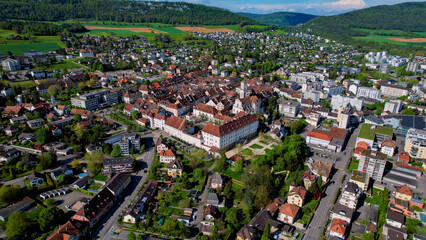 Panorama aerial of the old town of the city Delémont in Switzerland on a sunny noon in summer