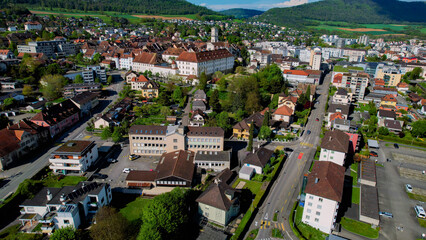 A panoramic aerial view around the old town of the city Delémont in Switzerland on a sunny spring...