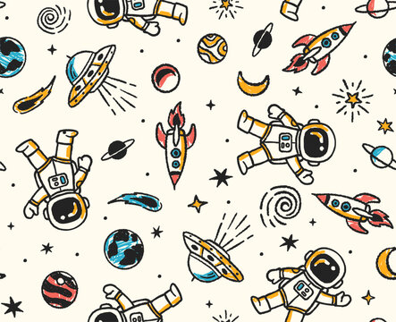 Hand-drawn space theme vector seamless pattern with UFOs, rockets, planets, stars, comets, and astronauts in a doodle art style