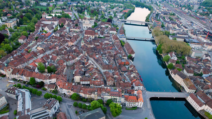A panoramic aerial view around the old town of the city Solothurn in Switzerland on a sunny spring...