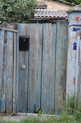 Abandoned old wooden door in the village. Old wooden door