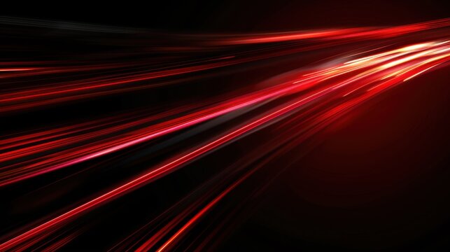 Dynamic red light trails create a stunning abstract effect in a dark setting during nighttime