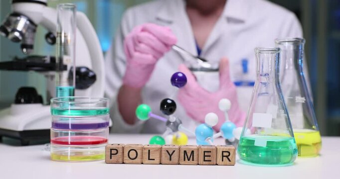 A vibrant lab scene showcasing advanced polymer research with colorful chemicals and intricate molecular models