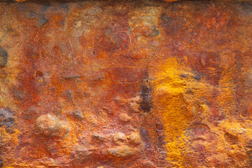 Metal corrosion abstraction. Weathered surface with grit and oxidation.