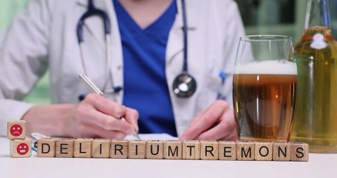 A healthcare professional reviews the risks of Delirium Tremens linked to alcohol use and dependency
