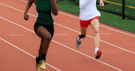 Runners Competing on a Track During a School Athletics Event