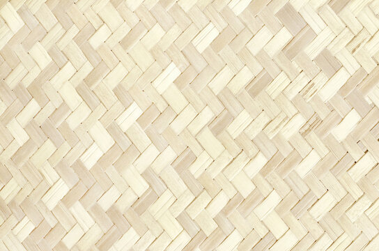 Old bamboo weave texture background, pattern of woven rattan mat in vintage style.