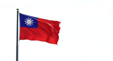 Taiwan's vibrant flag billows proudly against a clear sky.