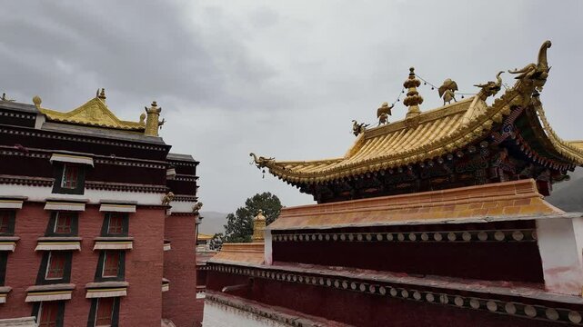 Xiahe, China: Panoramic footage of the Tibetan Buddhist Labrang Monastery in the Xiahe town in the Amdo region of Gansu province in China on a cloudy spring day. 
