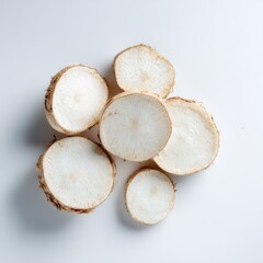 Sliced Taro Root Discs Displaying Natural Radiating Pattern and Organic Texture in Studio Light