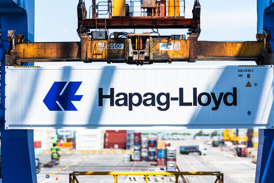 Busan New Port, South Korea - Hapag-Lloyd owned container unloaded from the container ship in the container terminal.