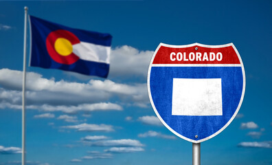 Interstate sign with flag of US State of Colorado