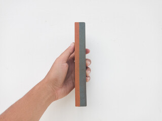 Sharpening stone held in hand