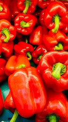 A group of fresh red bell peppers with glossy skin, isolated and neatly arranged. Perfect for food design, healthy eating themes, grocery advertisements, or cooking