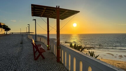 Sunset serenade along cobblestone promenade whispers solstice secrets, embracing twilight's descent, coastal reverie at golden hour