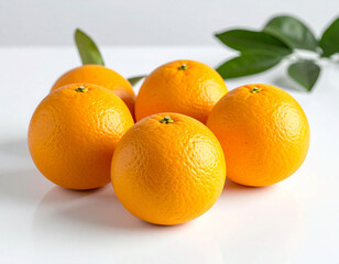 Fresh, Juicy Oranges with Leaves on a Clean White Background