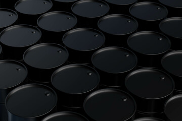 A row of black barrels with a hole in the middle