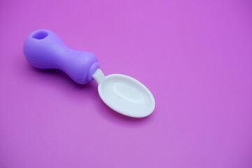 White Toy Spoon with Chunky Purple Handle