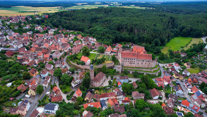 A panoramic aerial view around the old town in Cadolzburg Germany on a cloudy spring morning