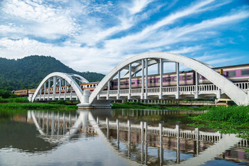 Beautiful landscape, white and pink bridge, Bangkok-Chiang Mai railway line, beautiful landmark of...