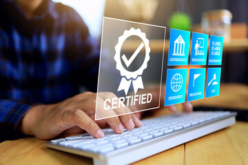 A man working certification approved with check mark on the computer means that it has been...