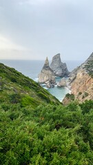 Jagged cliffs kiss the misty Atlantic, mirroring ancient Celtic whispers, sea saga celebrations,...