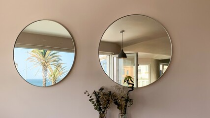 Reflections dance in minimalist round mirrors, coastal oasis vibes, Mediterranean whispers, Day of Silent Reflection, contoured tranquility