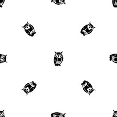 Fototapeta premium Seamless pattern of repeated black owl symbols. Elements are evenly spaced and some are rotated. Illustration on transparent background
