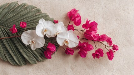 Tropical floral arrangement with orchids and bougainvillea