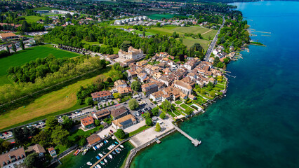 A panoramic aerial view around the old town of the city Coppet in Switzerland on a sunny spring noon