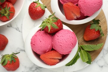 Refreshing sorbet, strawberries and mint on white marble table, flat lay