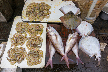 Fresh varieties of sea food meat like fishes, crabs, shrimp, prawns, squid, cuttlefish, octopus,...