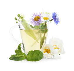 Aromatic herbal tea in glass cup, mint and flowers isolated on white