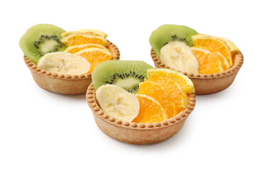 Tartlets with fruits isolated on white. Delicious dessert