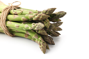 Bunch of fresh raw asparagus spears isolated on white