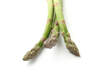 Fresh raw asparagus spears isolated on white