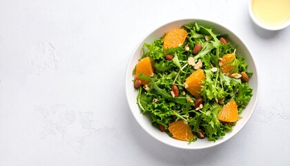 Modern salad plant-based concept. Fresh salad with kale and orange slices in a bowl.