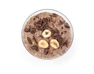 Delicious chocolate pudding with chia seeds and nuts in glass isolated on white