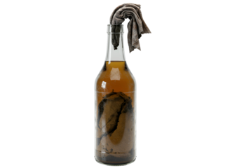 Molotov cocktail in a glass bottle with a burning wick isolated on transparent background