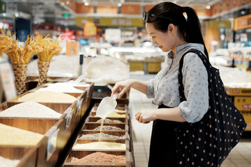 Woman Shopping for Grains in Grocery Store