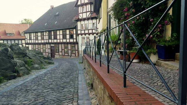Walking Forward Through Cobblestone Street in Quedlinburg, Germany